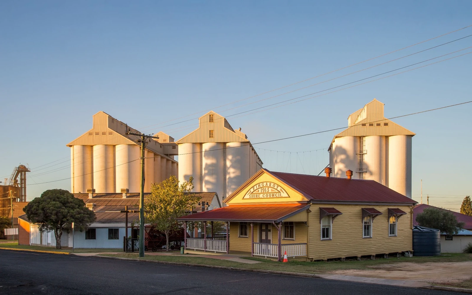 Kingaroy Shire Council building and grain silos in golden evening light