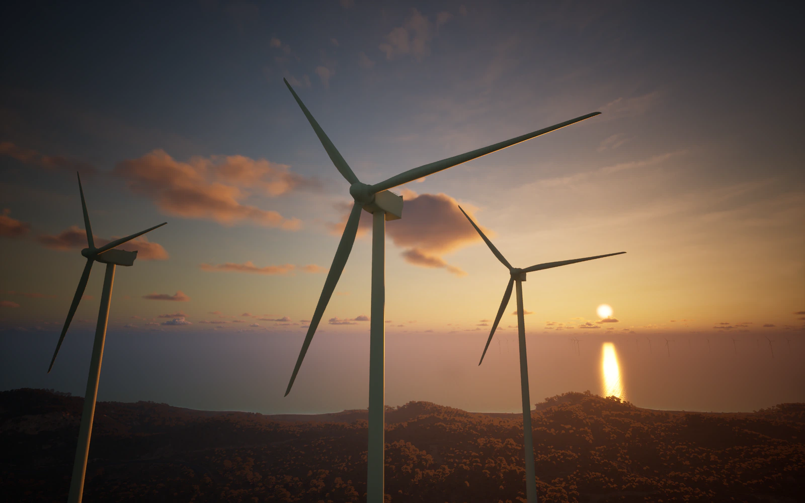 Digital twin render of wind turbines at sunset above a coastal landscape